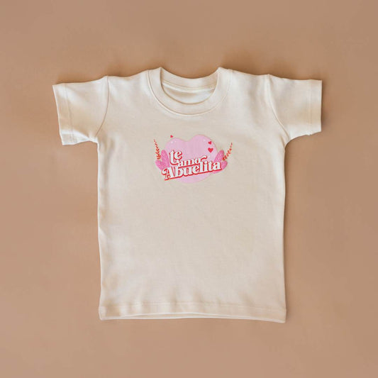 TE AMO ABUELITA ORGANIC GRAPHIC TEE. Crafted from the finest GOTS-certified organic natural colored Pima cotton from Peru, this tee is as gentle on your child's skin as it is on the environment. The soft, breathable fabric