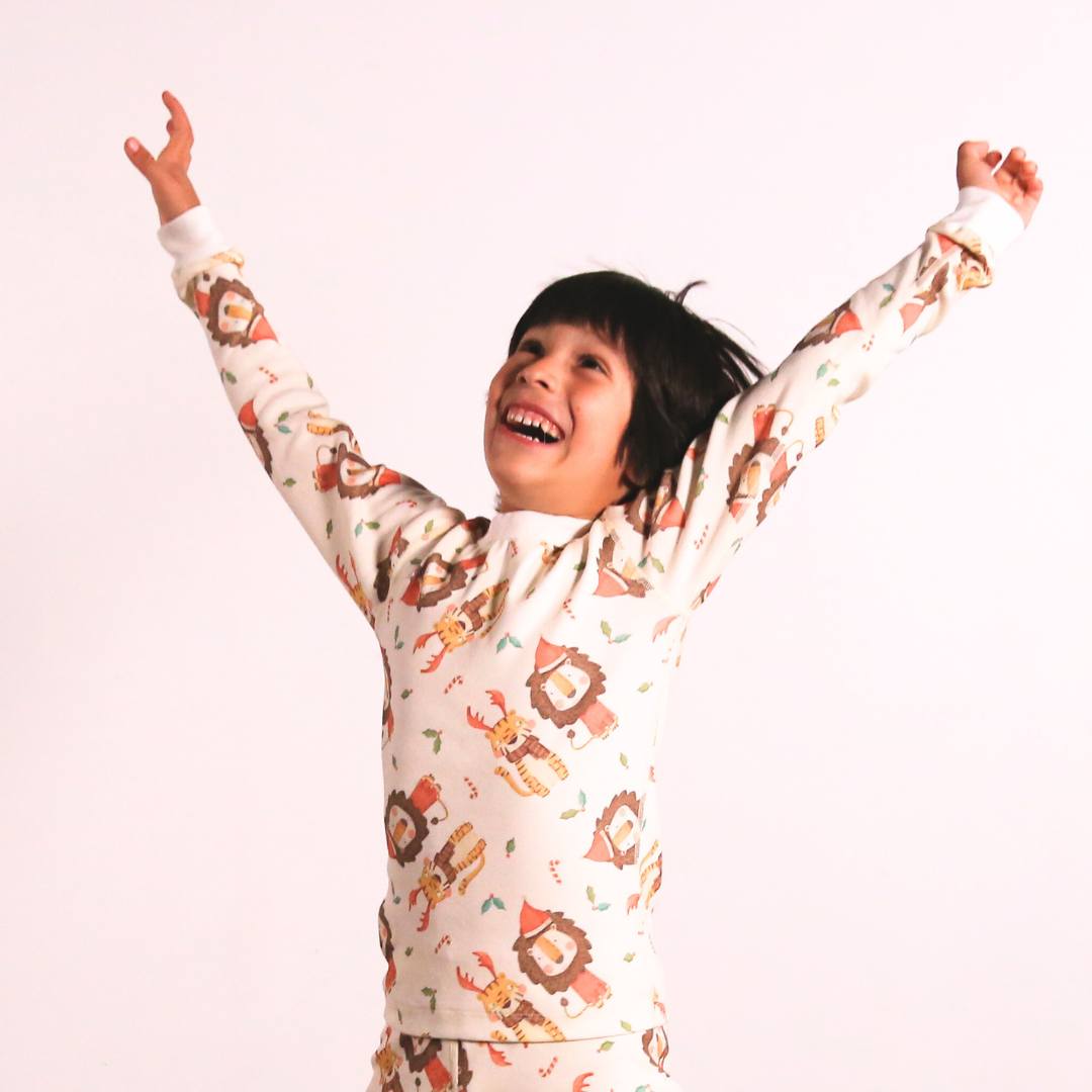 Mukupati’s Lions and Tigers Christmas Organic Pajamas for a holiday season filled with warmth, joy, and sustainability!