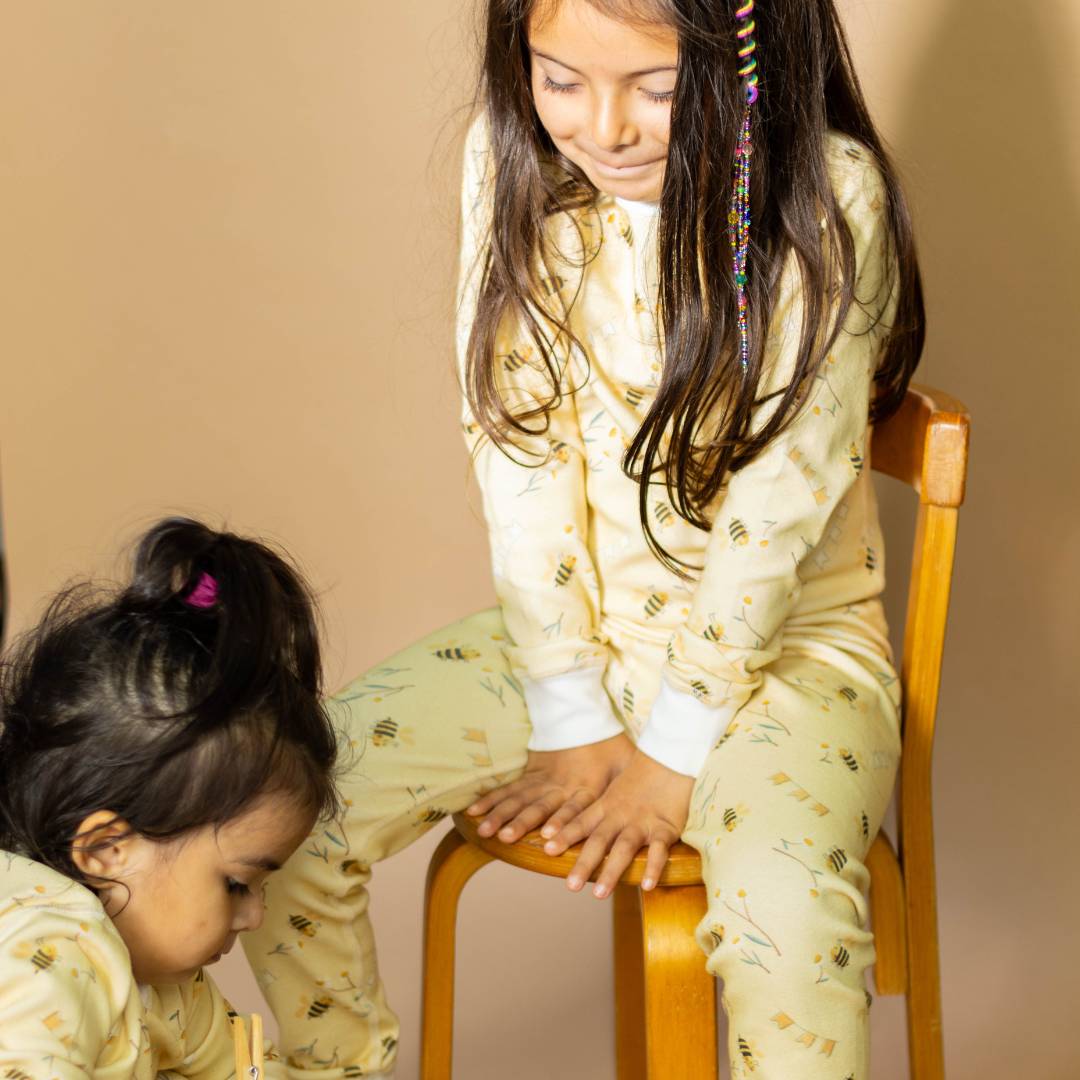 🌿 Made in the USA, these "Busy Bees" non-toxic pajamas prioritize your child’s well-being while also caring for the environment. GOTS Organic cotton. Sensitive Skin.