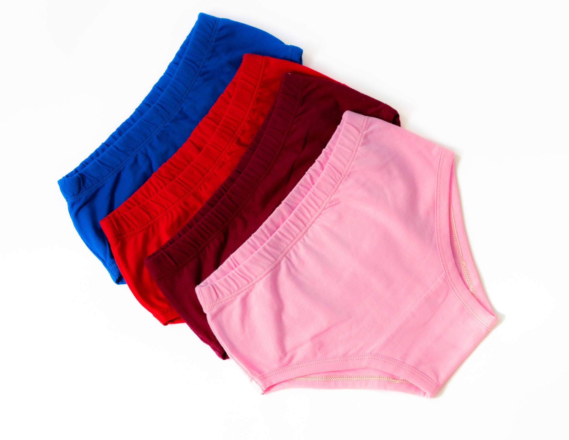 pack o 4 solid colors organic cotton undies. Made from non-toxic materials and featuring OEKO-TEX-certified fabrics, these undies are safe for your child and kind to the planet. 